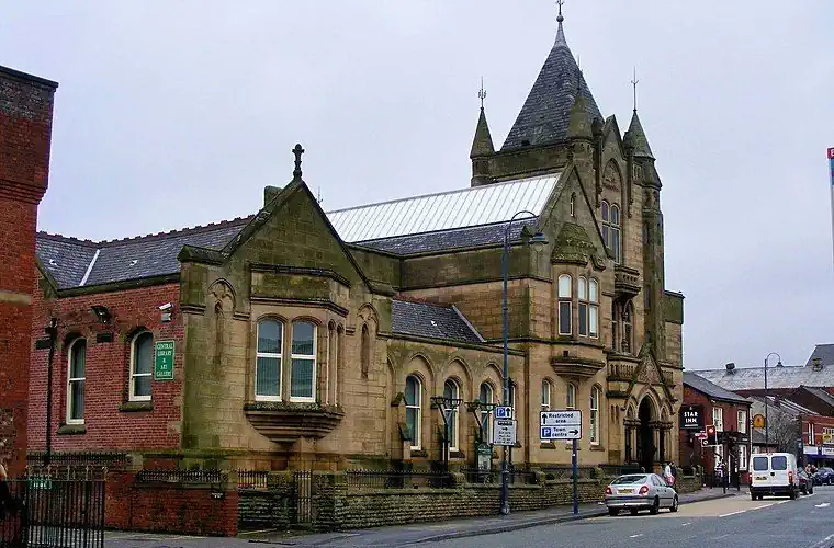 Ashton-under-Lyne Old Library, on the junction where many burials took place.