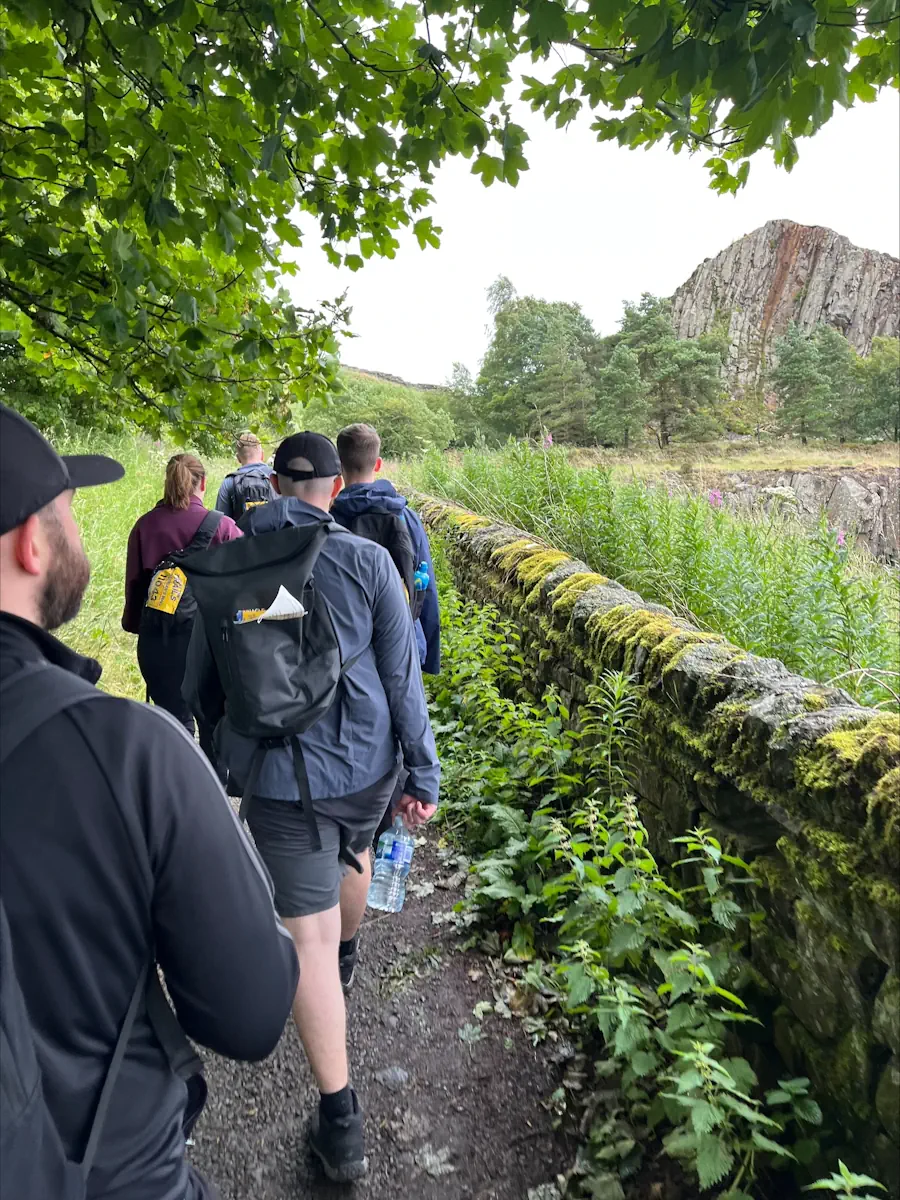 Besseges team members walking the Hadrian's Wall challenge route.
