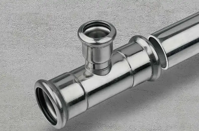 A Press fit stainless steel 316 tee with stainless steel press pipe.